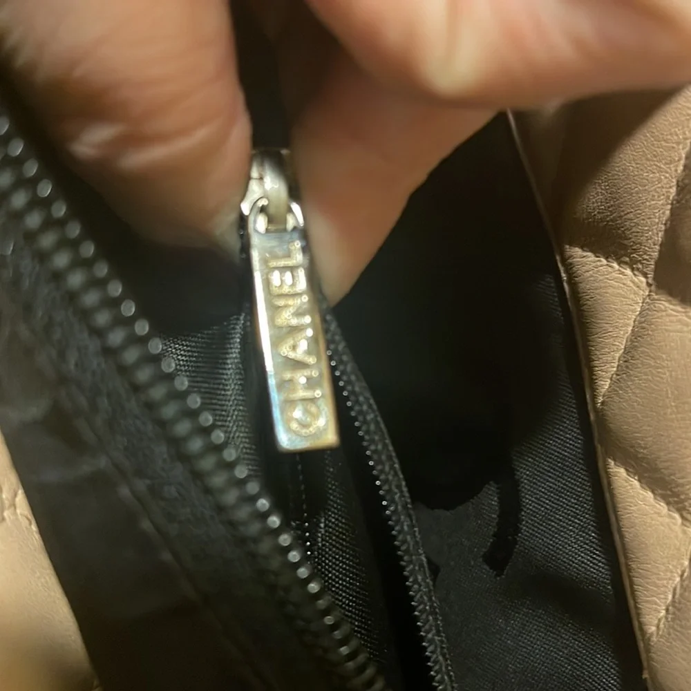 CHANEL Beige Quilted Tote with Black Accents